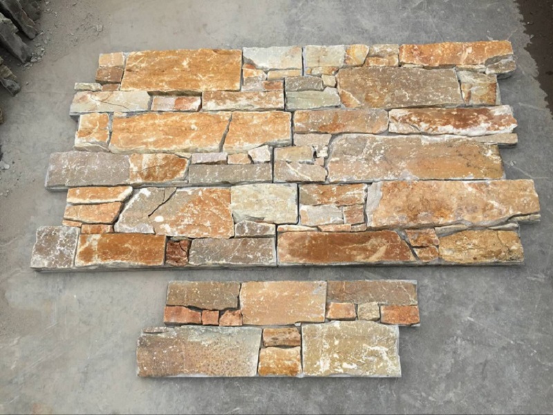 Stacked golden slate decorative panels for interior walls
